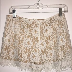 white lace nude slip zip shorts